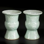 A set of two caldonaria cachepots decorated with plants. China, 20th century.