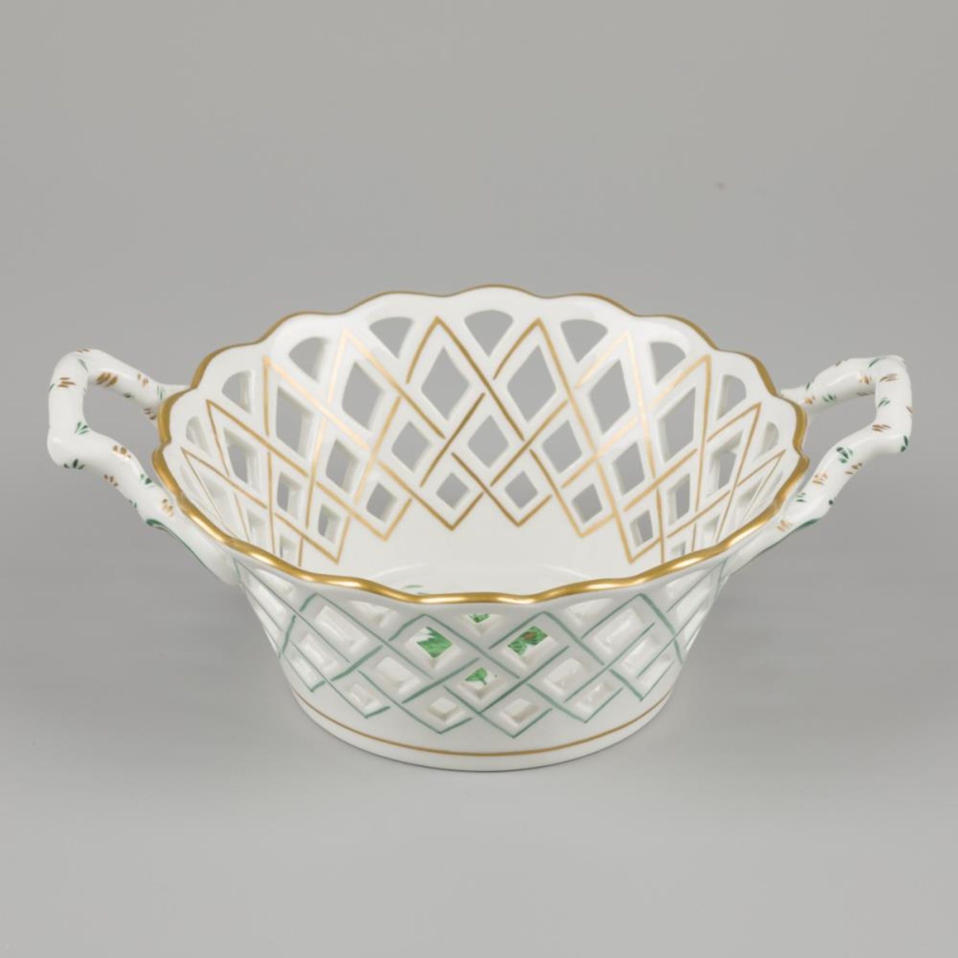 A porcelain openwork basket with apponyi green decor. Herend, late 20th century.