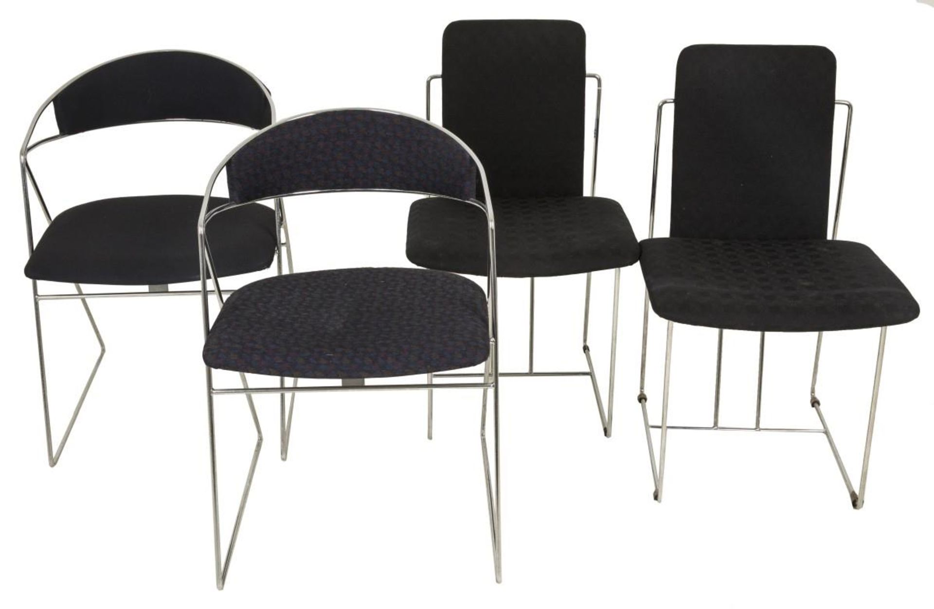 A lot comprising (4) designers bent steel chairs with upholstery.