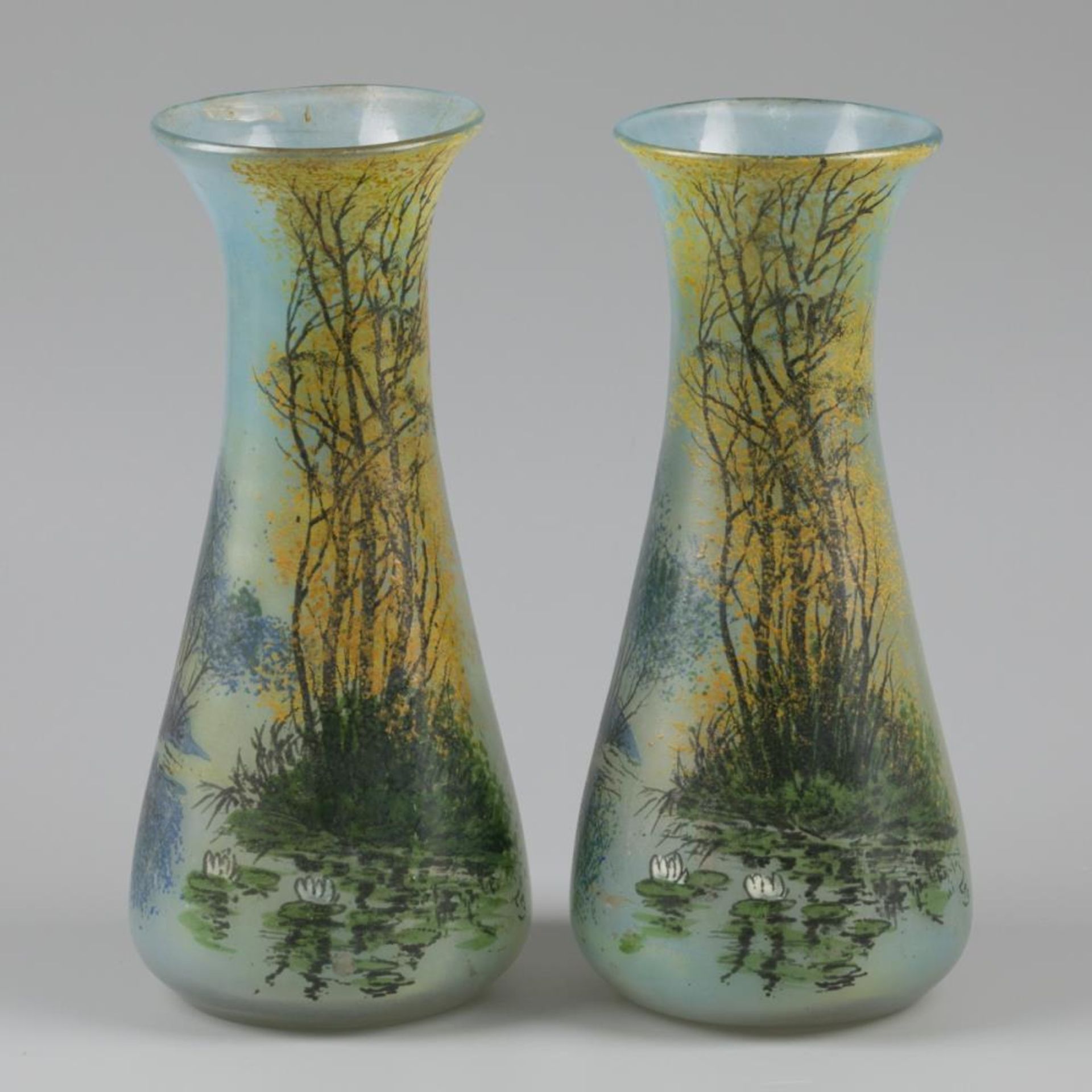 A set of (2) cold-painted glass vases decorated with a landscape. François-Théodore Legras( 1839- 19