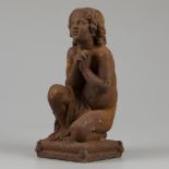 A cast iron cast of a praying child, ca. 1930.