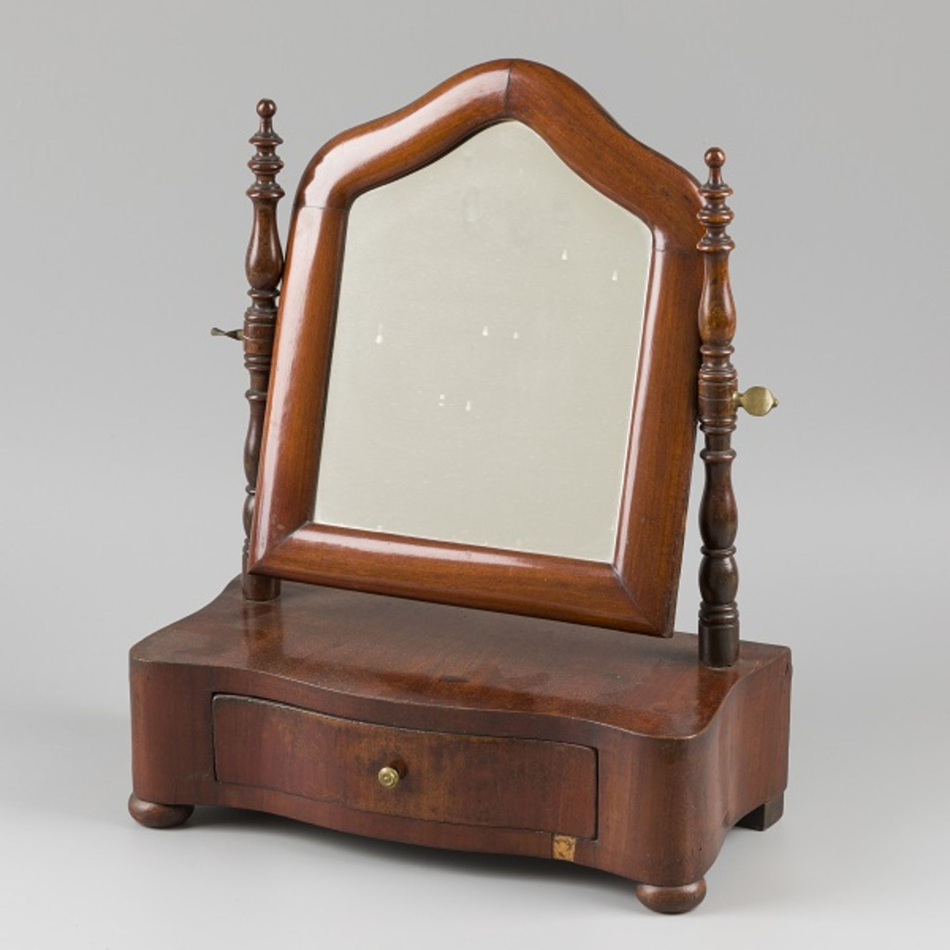 A mahogany veneered toilet mirror / vanity mirror, Germany(?), 19th century.