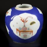 A porcelain poudre blue ginger jar with famille rose decoration. China, 19th century.