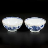 A set of (2) porcelain bowls with river landscape decor. China, Qianlong 18th century.