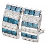 14K. White gold earrings set with approx. 1.44 ct. white and blue diamonds.