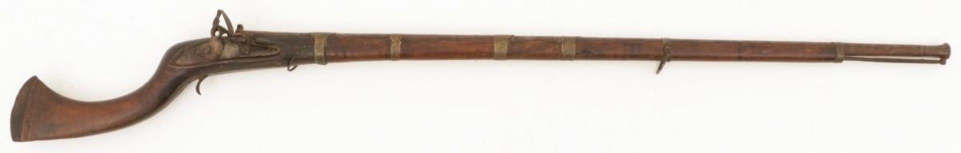 An Afghan long flintlock percussion rifle, 19th century.