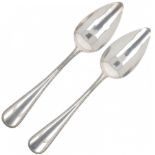 (2) piece set vegetable spoons silver.