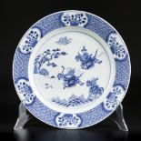A porcelain dish with Joosje on horseback decor, marked with conical shell. China, Kangxi.