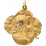 18K. Yellow gold Art Nouveau relief pendant set with rose cut diamonds and seed pearls.
