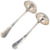 (2) piece set of sauce spoons ''Haags Lofje'' silver.