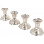 (4) piece set of table candlesticks silver.