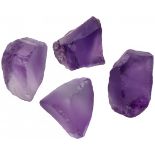 Lot of 4 uncut amethysts.