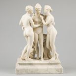 A cast marble group of the three graces of charitas.