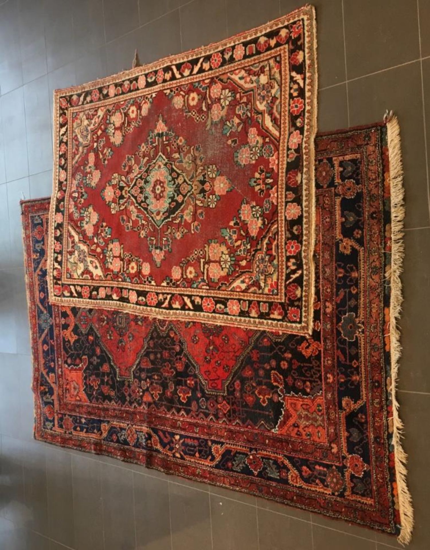 A lot comprised of (2) carpets, Iran, 2nd half 20th century.