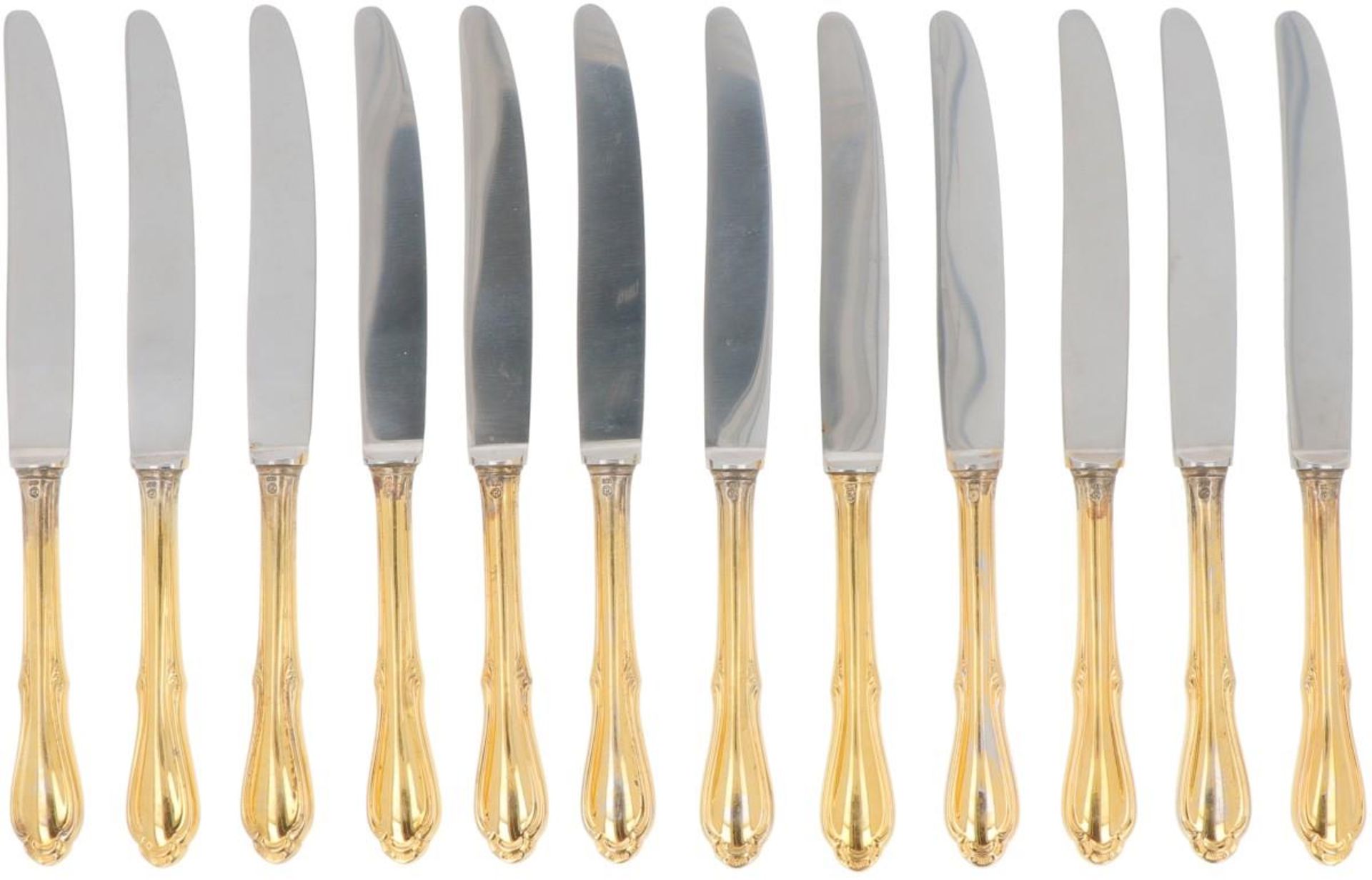 (12) piece set of fruit knives gilded silver.