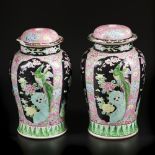A set of (2) porcelain lidded vases with floral decoration. Japan, circa 1900.