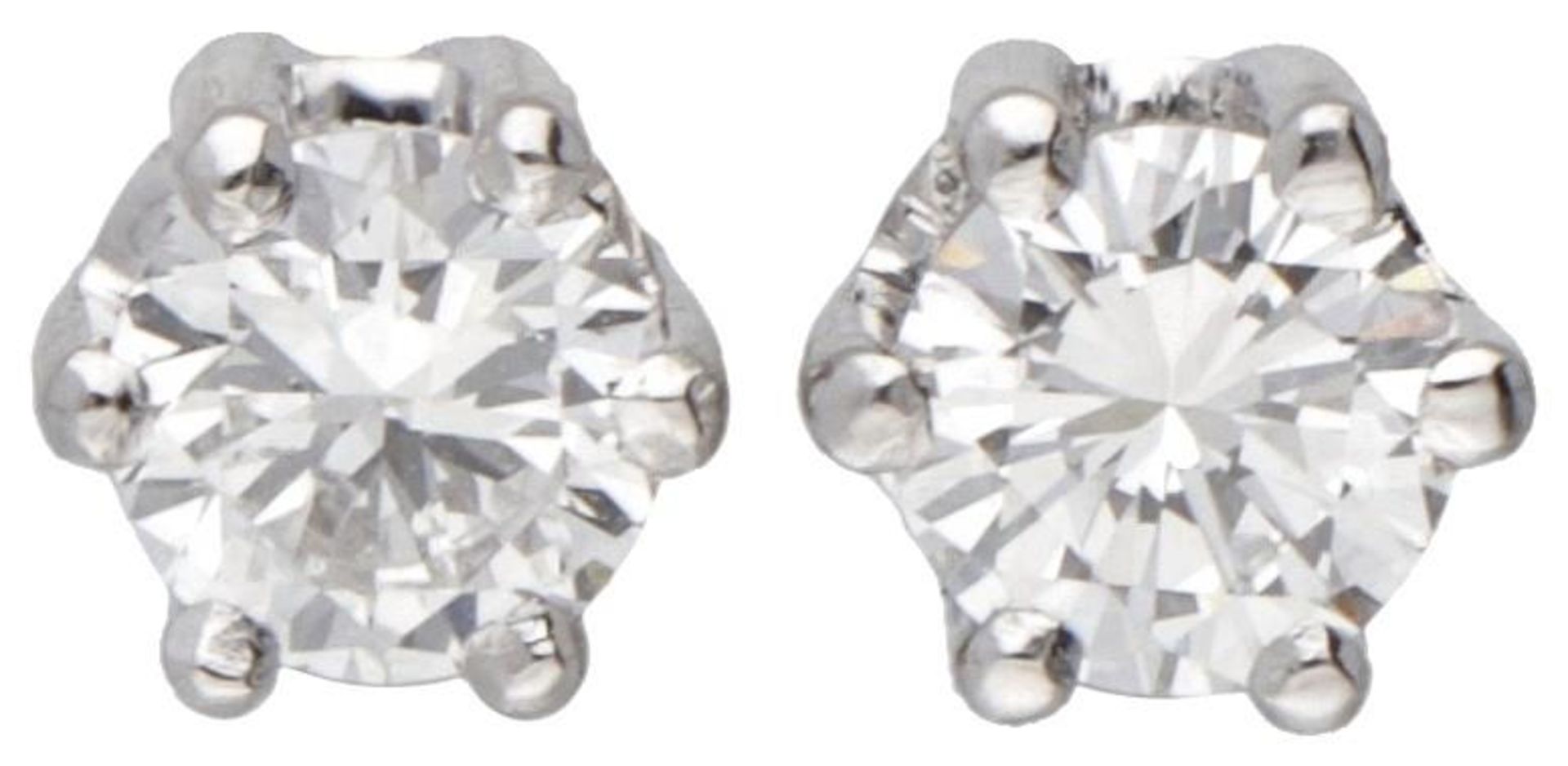 14K. White gold solitaire earrings set with approx. 0.40 ct. diamond.