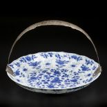 A porcelain plate with foliate decor and floral interior Chinese Kangxi with silver mount 19th centu