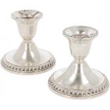 (2) piece set of table candlesticks silver.