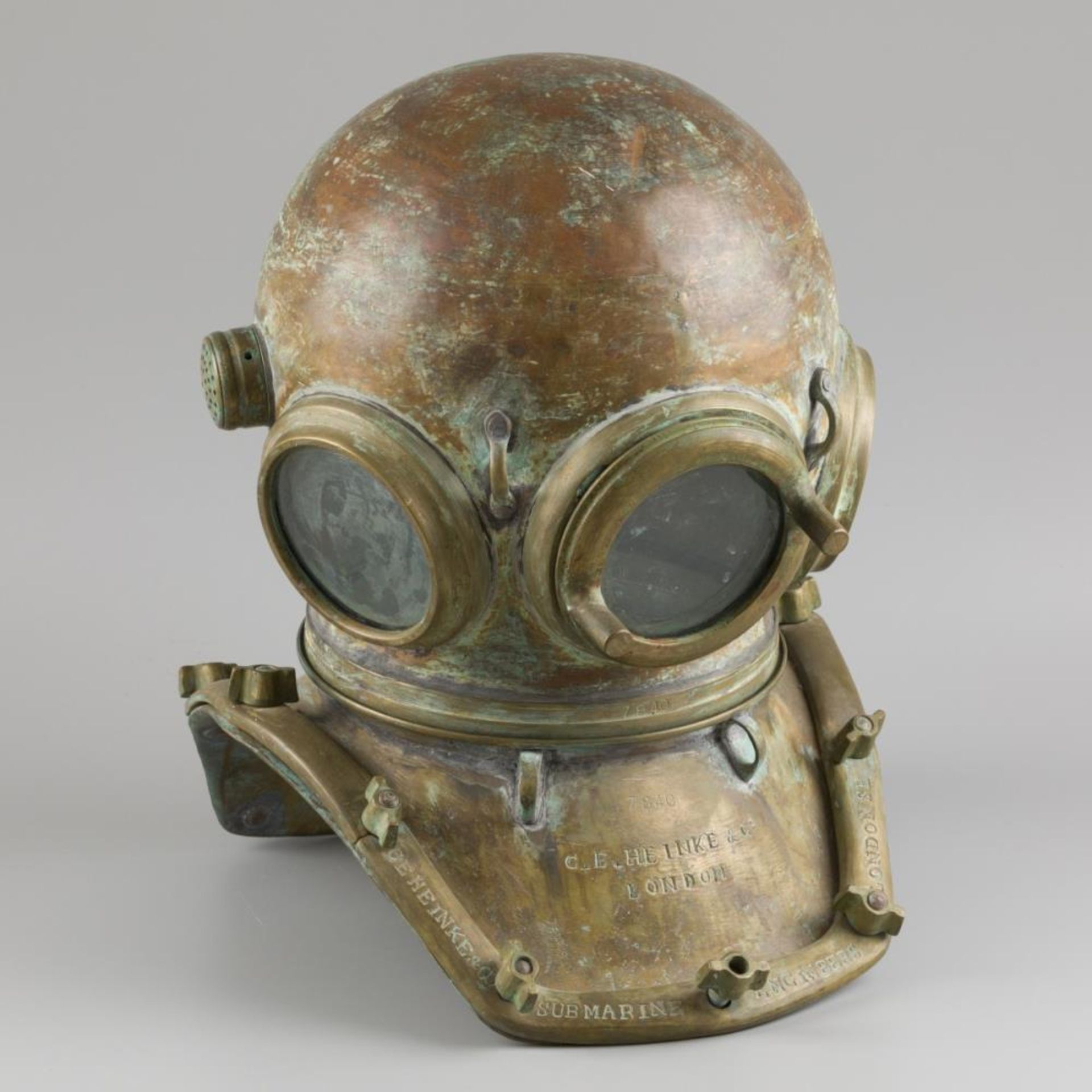 A 12-bolt brass diving helmet by C.E. HEINKE & Co. LTD, London, ca. 1930.