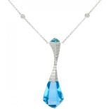 18K. White gold necklace and pendant set with approx. 0.36 ct. diamond and blue topaz.