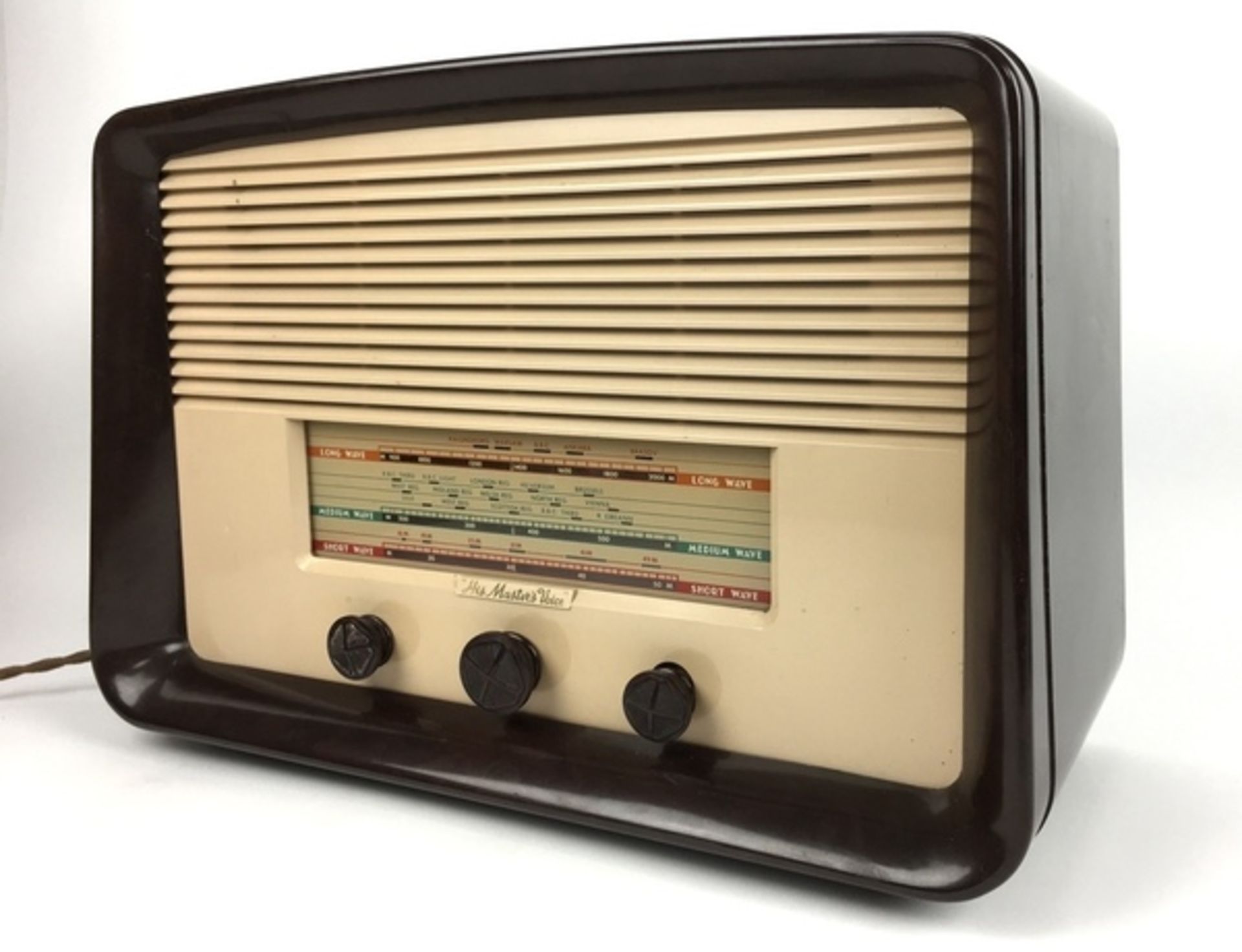 (Curiosa) Radio “His Master’s Voice” Bakelieten radio "His Master's Voice" model 1128. Ci