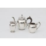 A Dutch Sterling silver teapot and milkjug. 1882 and 1883.