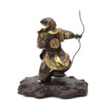 A parcel gilt Japanese bronze okimono, archer. 20th century