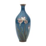 A blue Japanese cloisonné vase decorated with irises. Early 20th century.