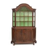 An oak Dutch display cabinet with arched hood, 18th century.