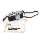 A Leica MIIf camera body with a Leitz Elmar f = 5cm 1:3,5 lens.