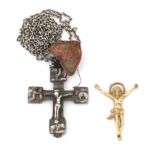 A reliquary crucifix pendant, silver mounted with a sapphire.