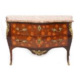 A French rose wood marquetry inlaid commode, Louis XV style