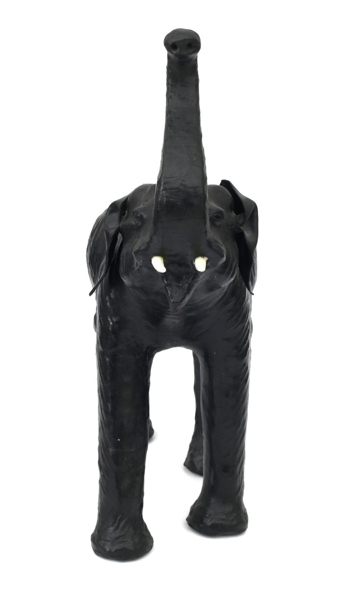 A black leather lined figure of an elephant with white plastic tusks. 75 x 65 x 23 cm. (hxwxd) - Bild 2 aus 2