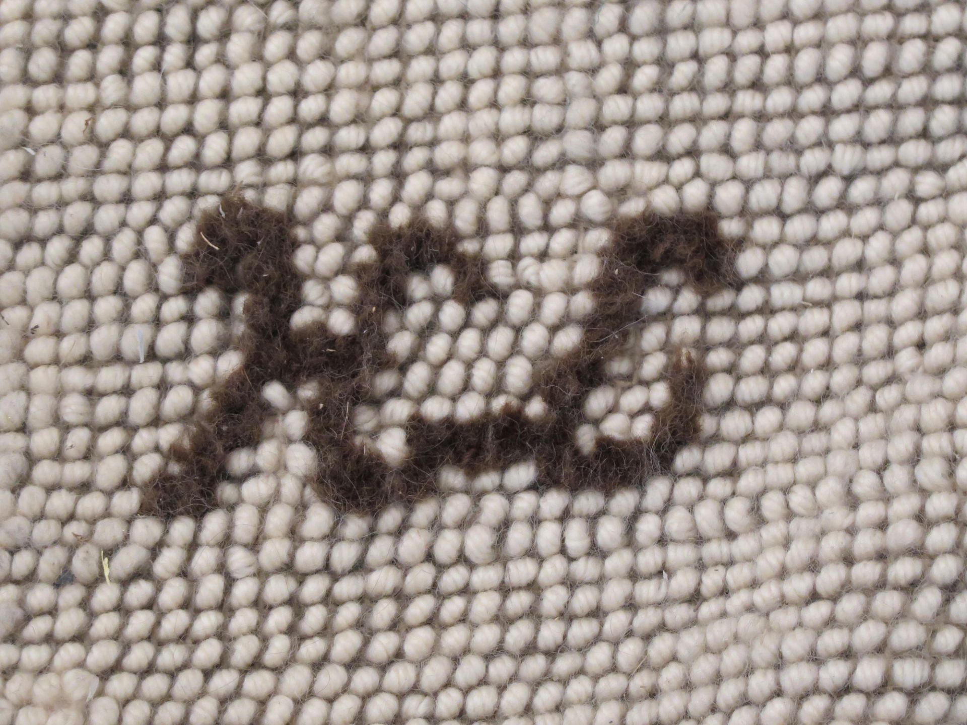 A large hand woven wall tapestry decorated with circular shapes and alfa and omega, signed lower - Image 3 of 4