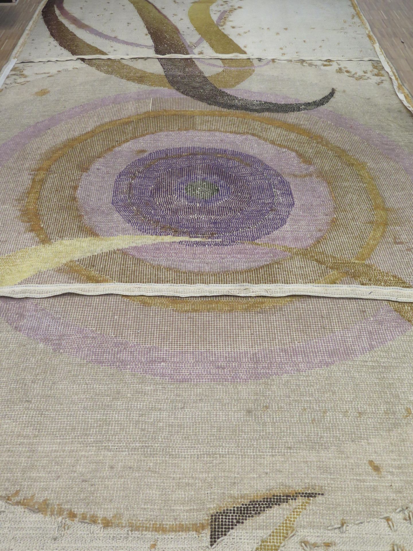 A large hand woven wall tapestry decorated with circular shapes and alfa and omega, signed lower - Image 2 of 4