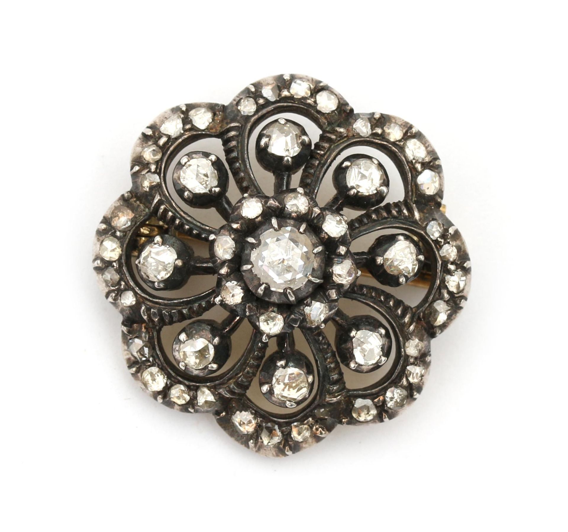 A 14 karat gold and silver rose cut diamond cluster brooch