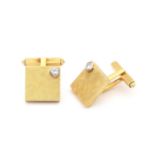 A pair of 18 karat gold diamond cuff links, ca. 1970