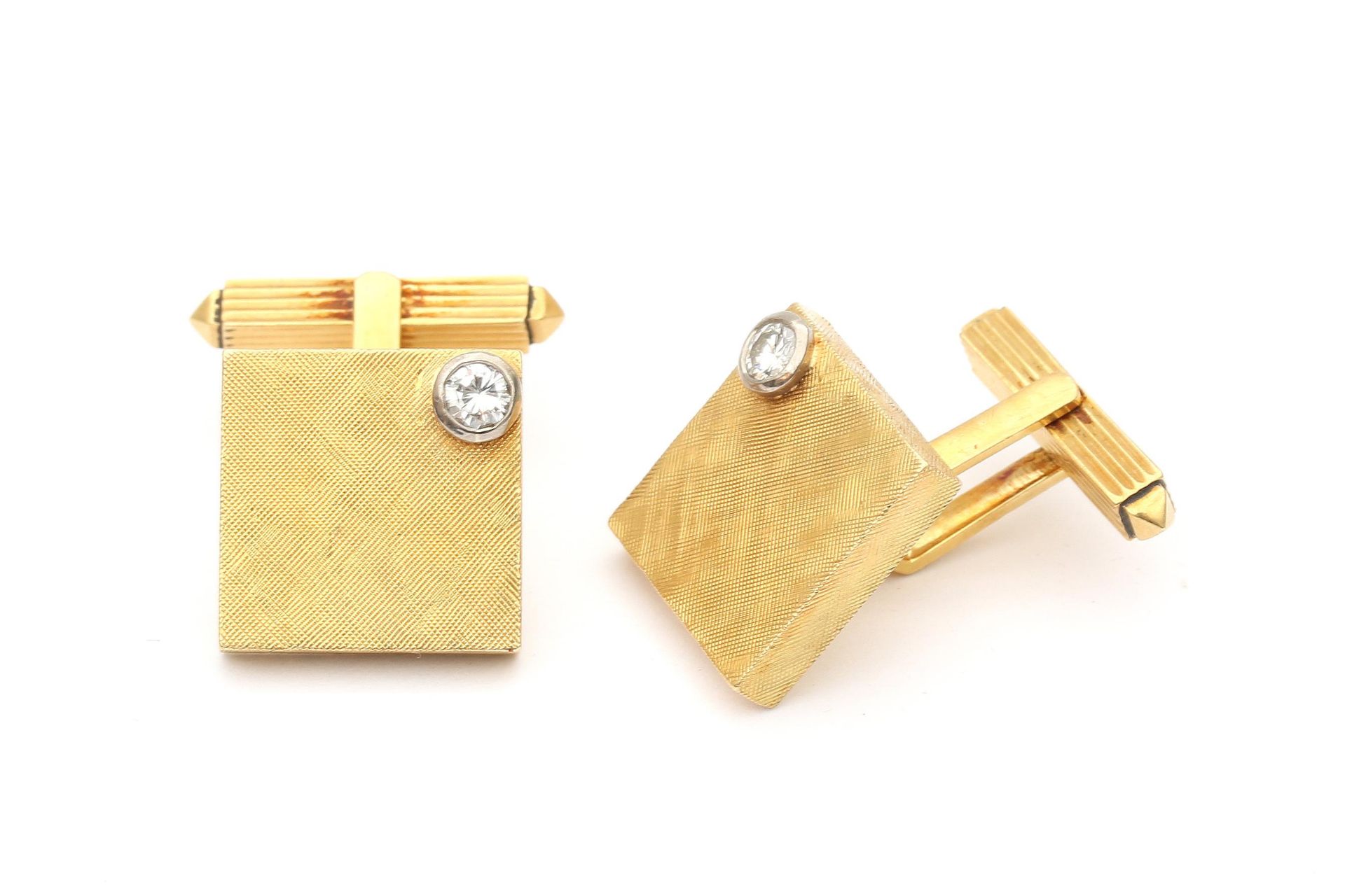 A pair of 18 karat gold diamond cuff links, ca. 1970