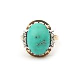 A 14 karat turquoise and diamond ring