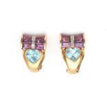 A pair of 14 carat yellow gold topaz and amethyst earrings