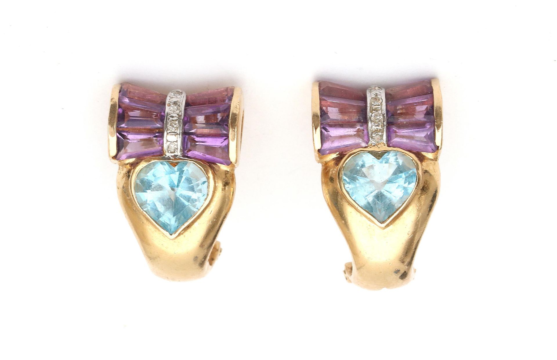 A pair of 14 carat yellow gold topaz and amethyst earrings