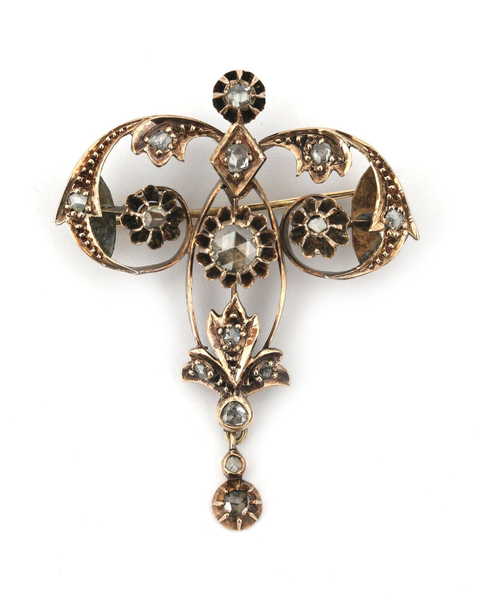 A gold rose cut diamond Art Nouveau brooch