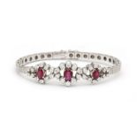 An 18 karat white gold ruby and diamond bracelet