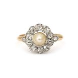 An 18 karat gold diamond and pearl cluster ring