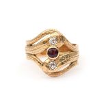 A 14 karat gold gold diamond and ruby snake ring