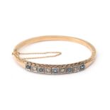 A 14 karat rose gold sapphire and diamond Victorian bangle