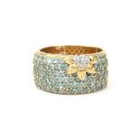 An 18 karat gold ring with topaz and diamond