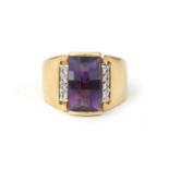 An 18 karat gold amethyst and diamond ring