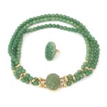 A jade necklace and a 14 karat gold jade ring